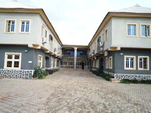 The central courtyard and dual-wing architecture of Amanda Garden Hotel with main entrance portico.